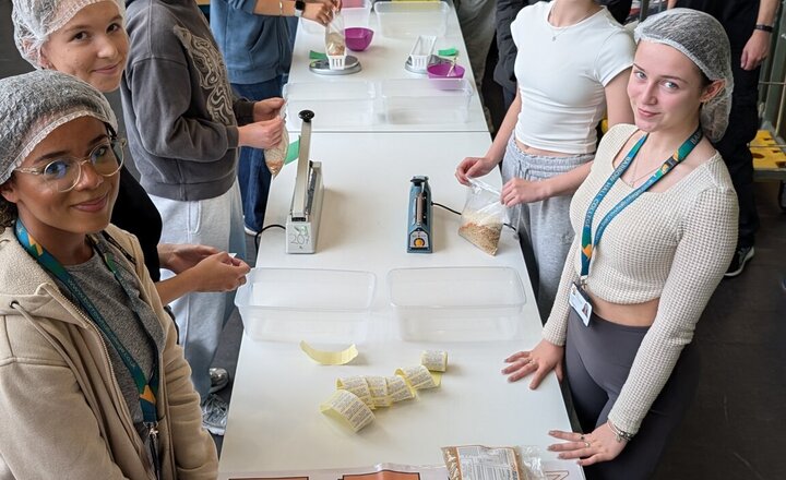 Image of Students Pack 5,000 Meals for Children in Need Through Million Meals Project