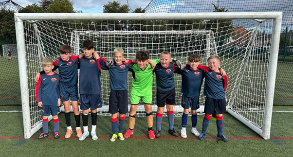 Image of Year 5&6 football team - 2nd Place!