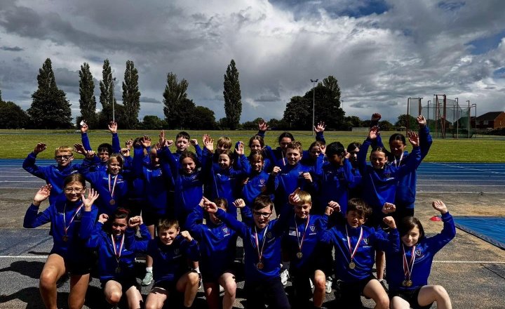 Holy Family celebrating their sporting achievement during the Town Sports event