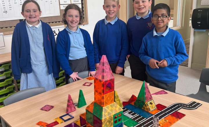 Year 5, Holy Family pupils with their constructed buildings from the STEM event