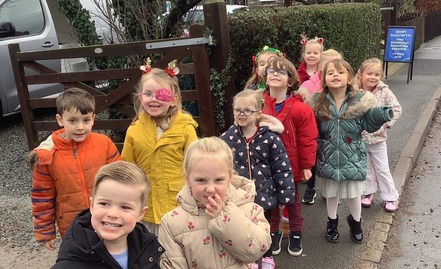 Image of Class 1 visit the post office to post a very special letter