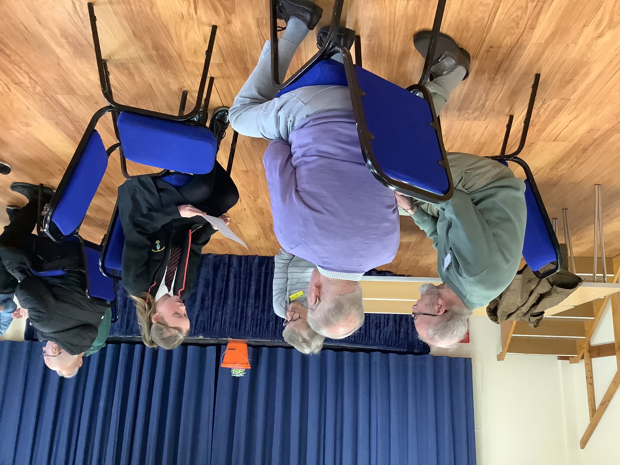 Image of Reading at the village hall with Dementia Caring Charity