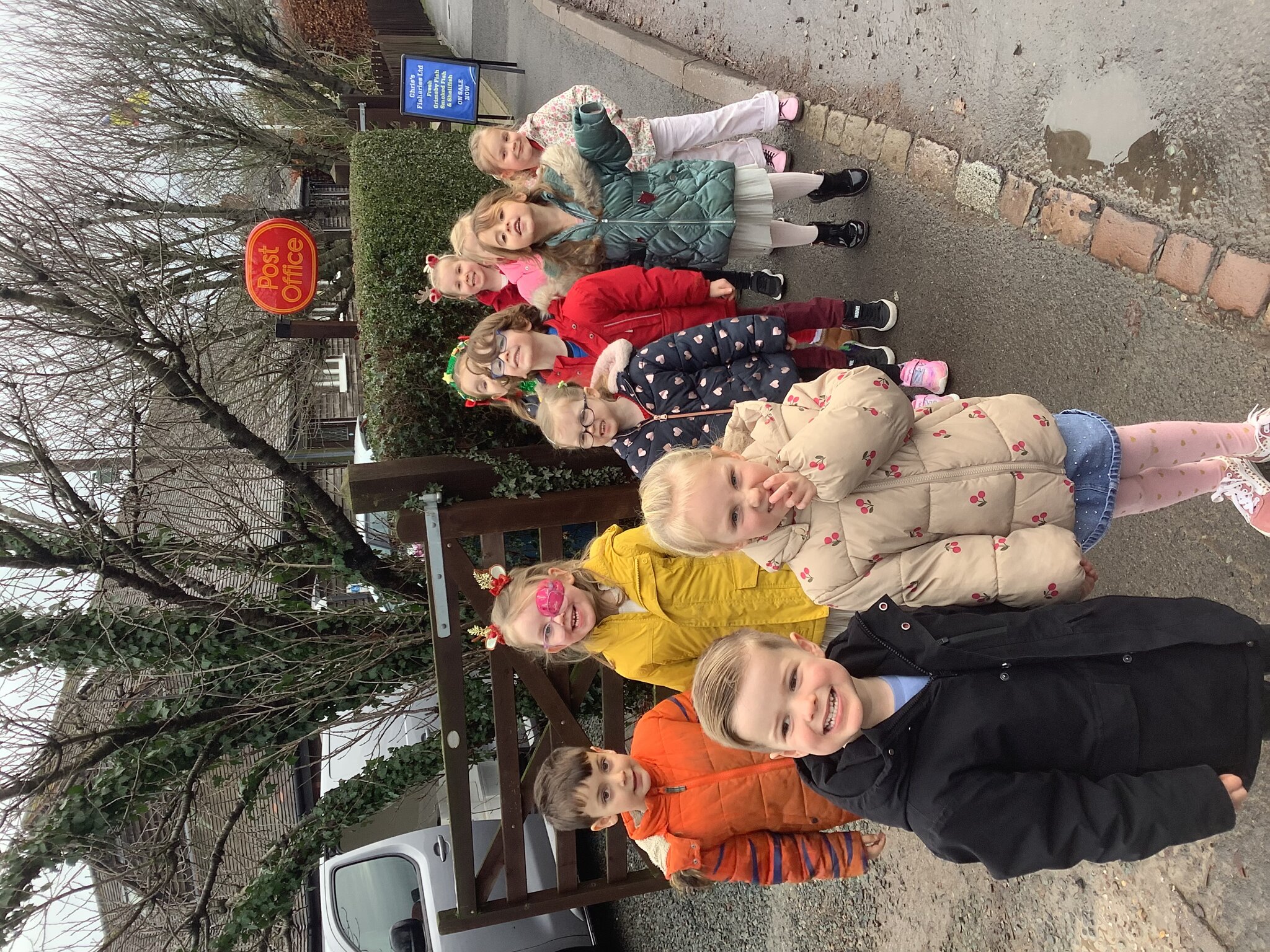 Image of Class 1 visit the post office to post a very special letter
