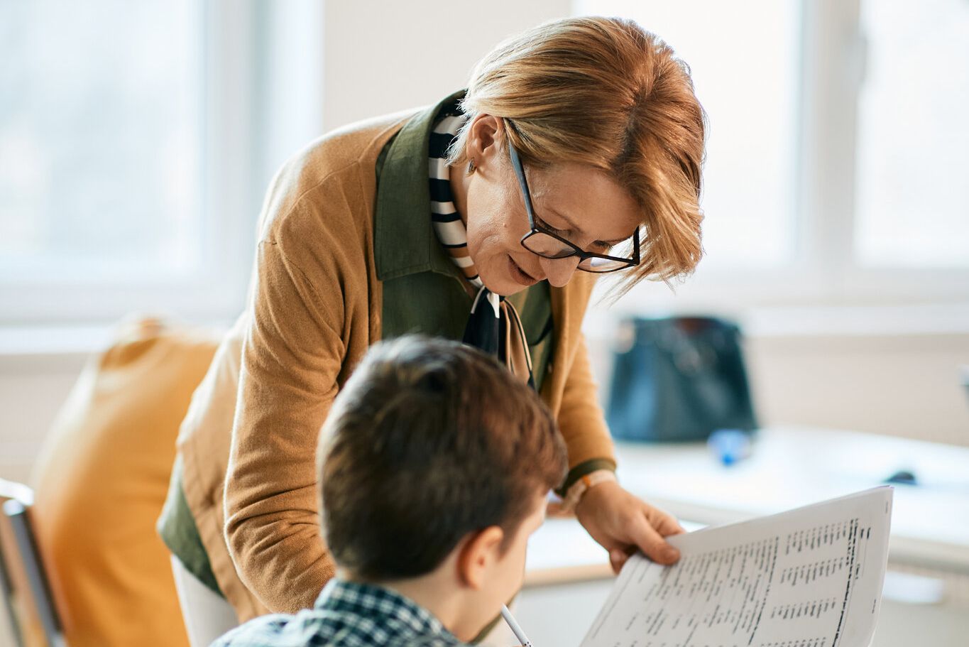Teacher interacting with student