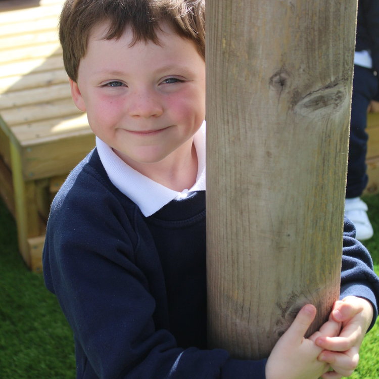 Image of I1 enjoy their new outdoor area in the sunshine!