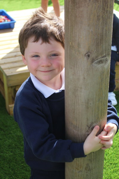 Image of I1 enjoy their new outdoor area in the sunshine!