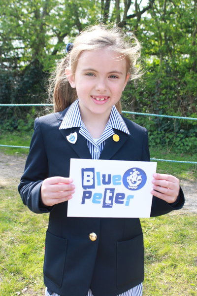 Image of I2 pupil, Iris, awarded the coveted Blue Peter Badge!