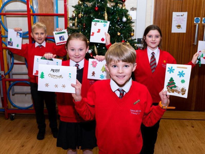 Image of Year 5 make Christmas Cards for local care home.