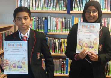Image of Iqra and Mohammed are awarded the Summer Reading Challenge