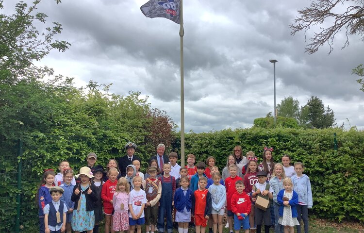 Image of Raising the VE Day flag!