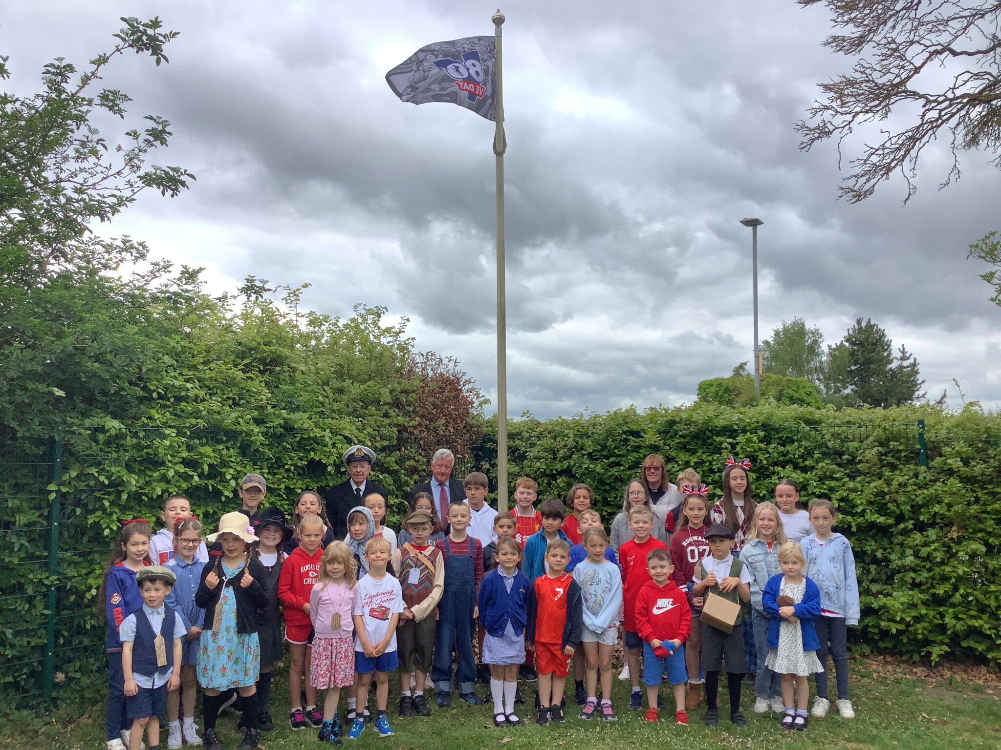 Image of Raising the VE Day flag!