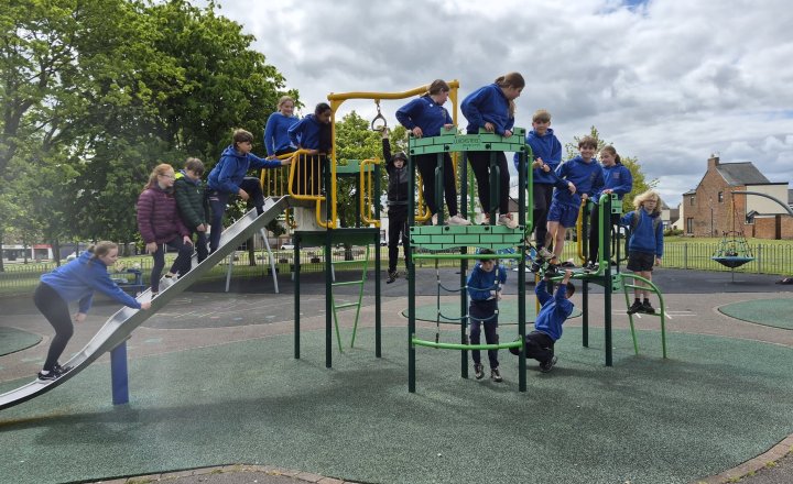 Year 6 pupils celebrating SATs being finished with a picnic in the park