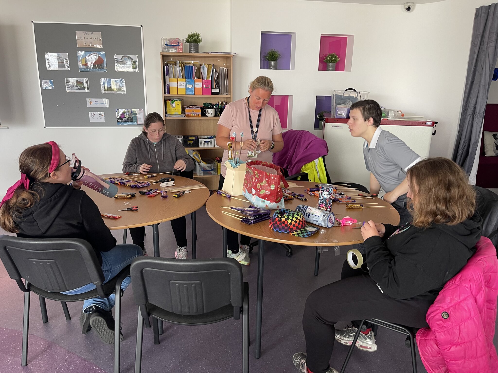 Image of Enterprise in Action: Crafting Chocolate Bouquets for Summer Production