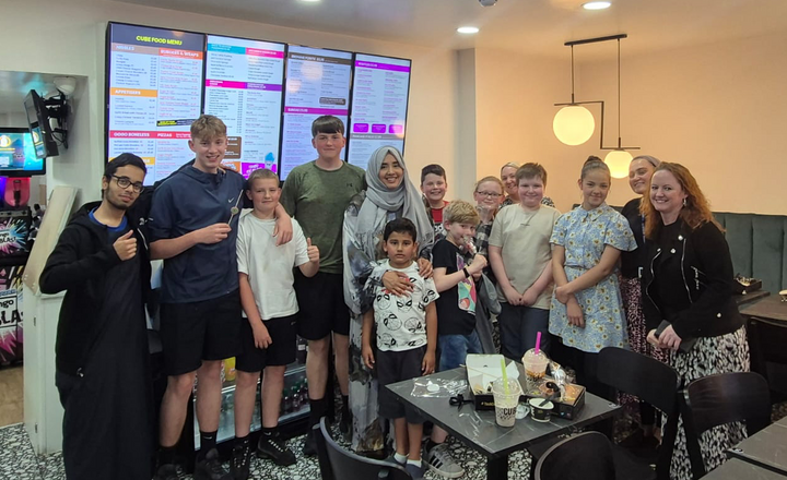 Image of Celebrating Eid al-Adha with Sweet Treats and Shared Culture