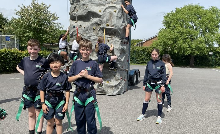 Image of Reaching New Heights:  Rewards Day Climbing Wall Experience