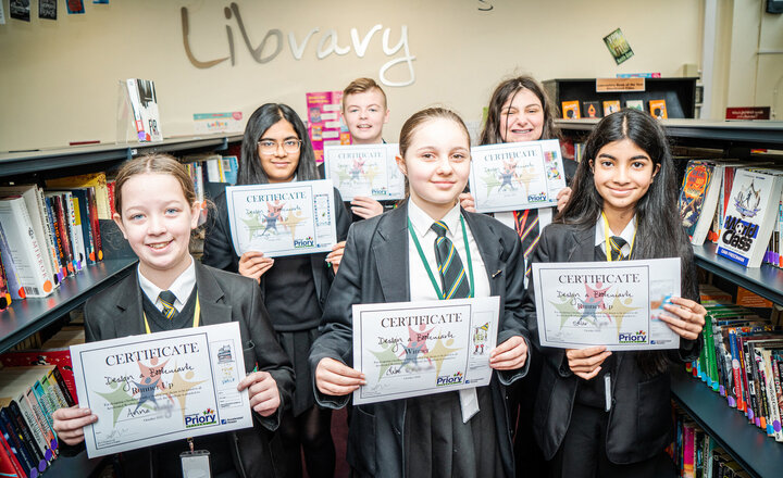 Image of Year 8 have designs on their books for competition