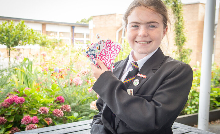 Image of Abigail marks her words with the English Department