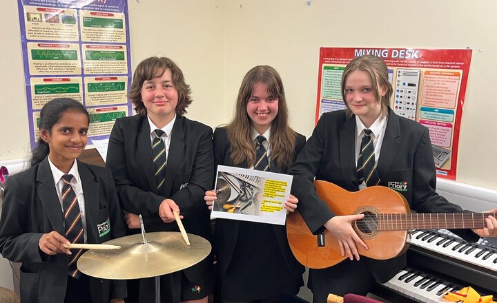 Image of Year 8 girls lock pupils into the music room