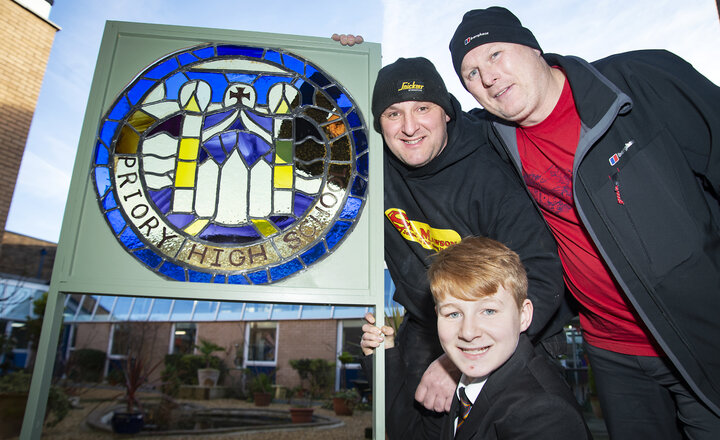 Image of Former pupils reflect back through the glass