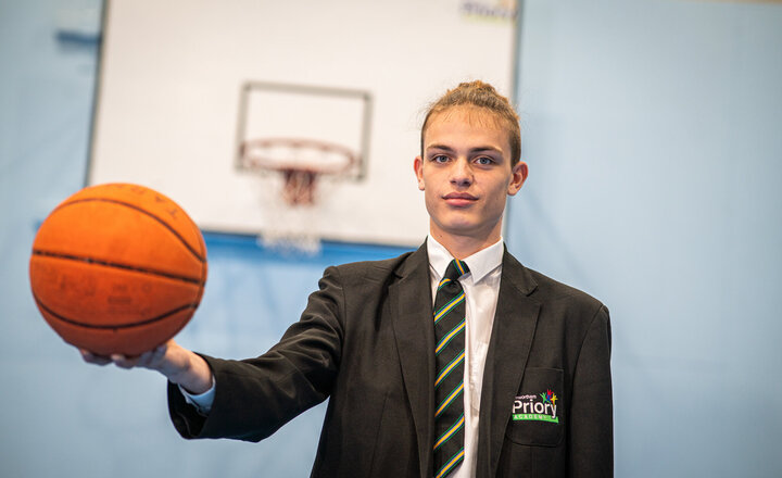 Image of Year 11 pupil aims high at basketball