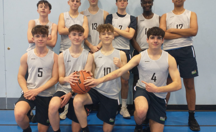 Image of Year 11 basketball team slam dunk the competition