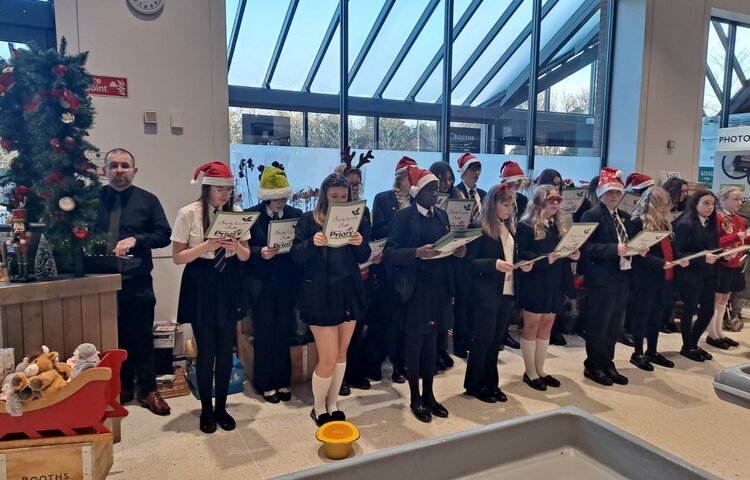 Image of Carol Singer Bring Festive Joy To Our Community