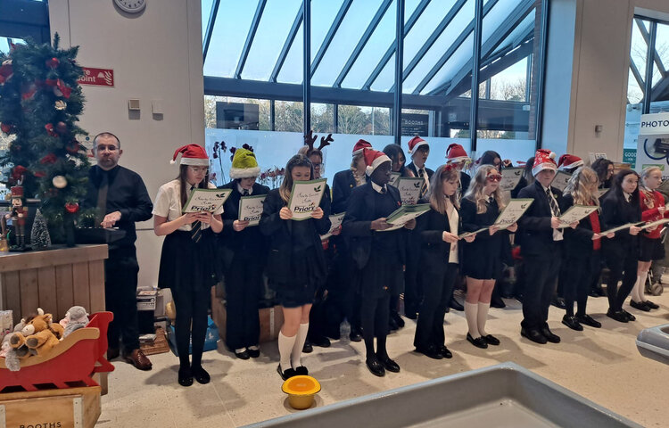 Image of Carol Singer Bring Festive Joy To Our Community