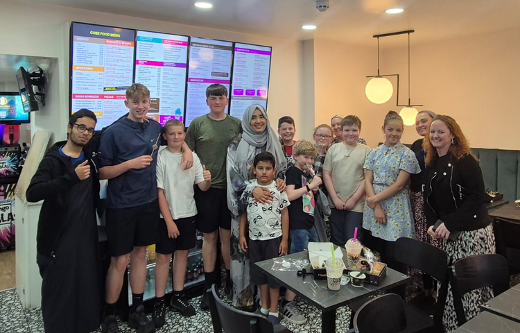 Image of Celebrating Eid al-Adha with Sweet Treats and Shared Culture