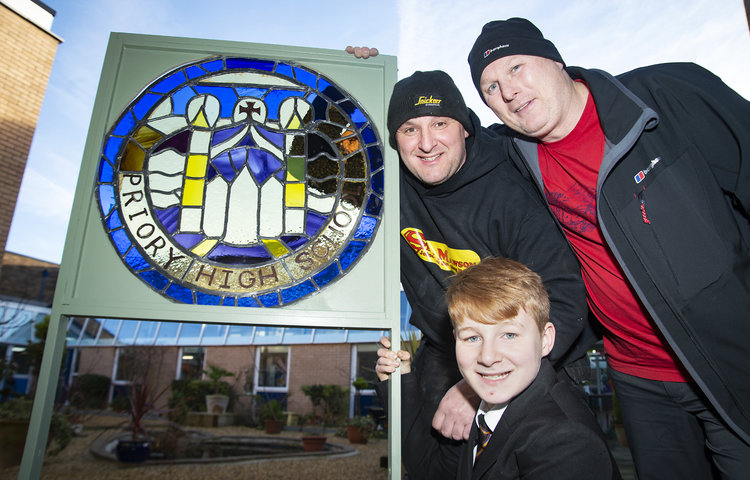 Image of Former pupils reflect back through the glass