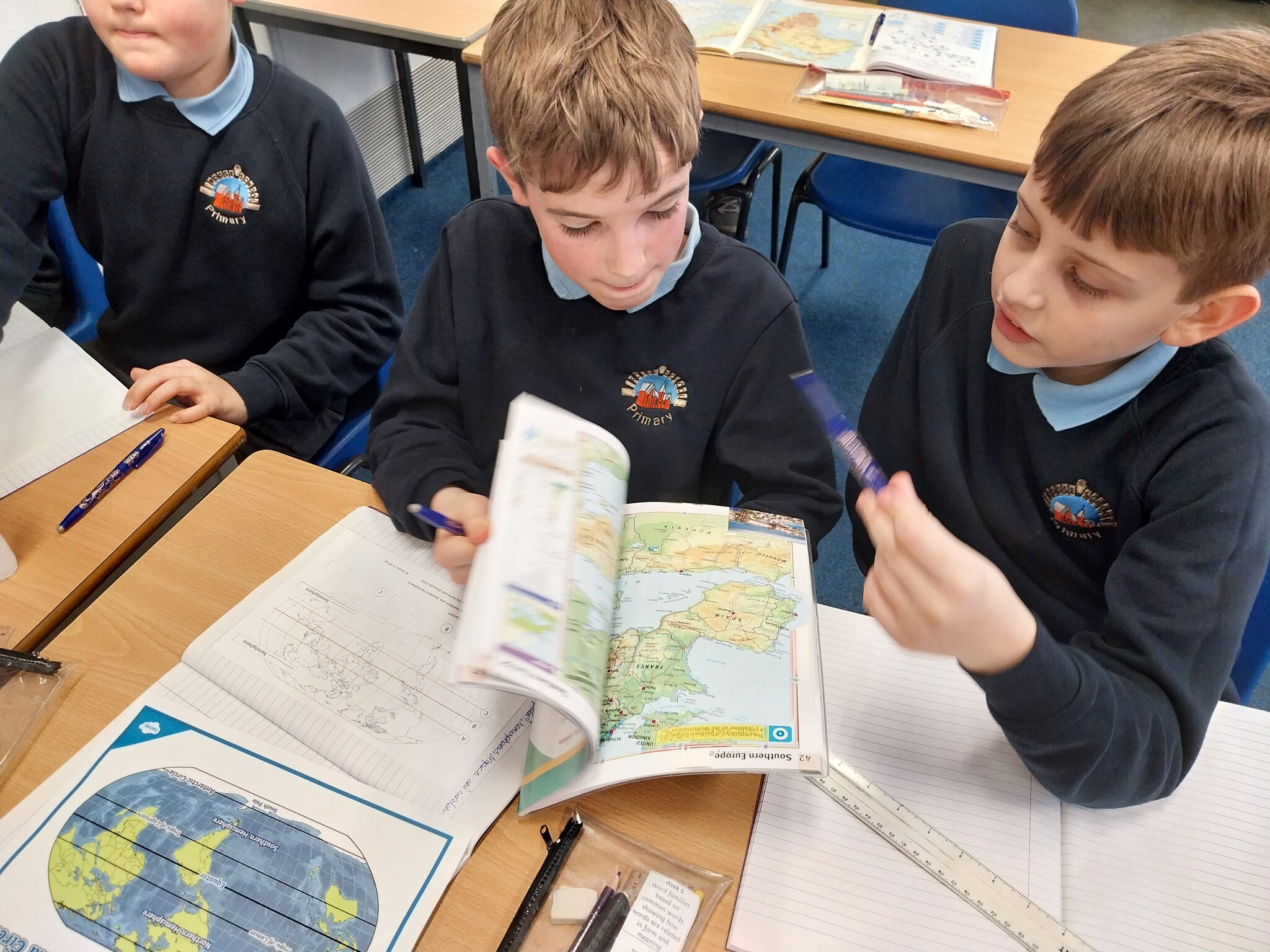 Image of Y6 using atlases to learn about Africa