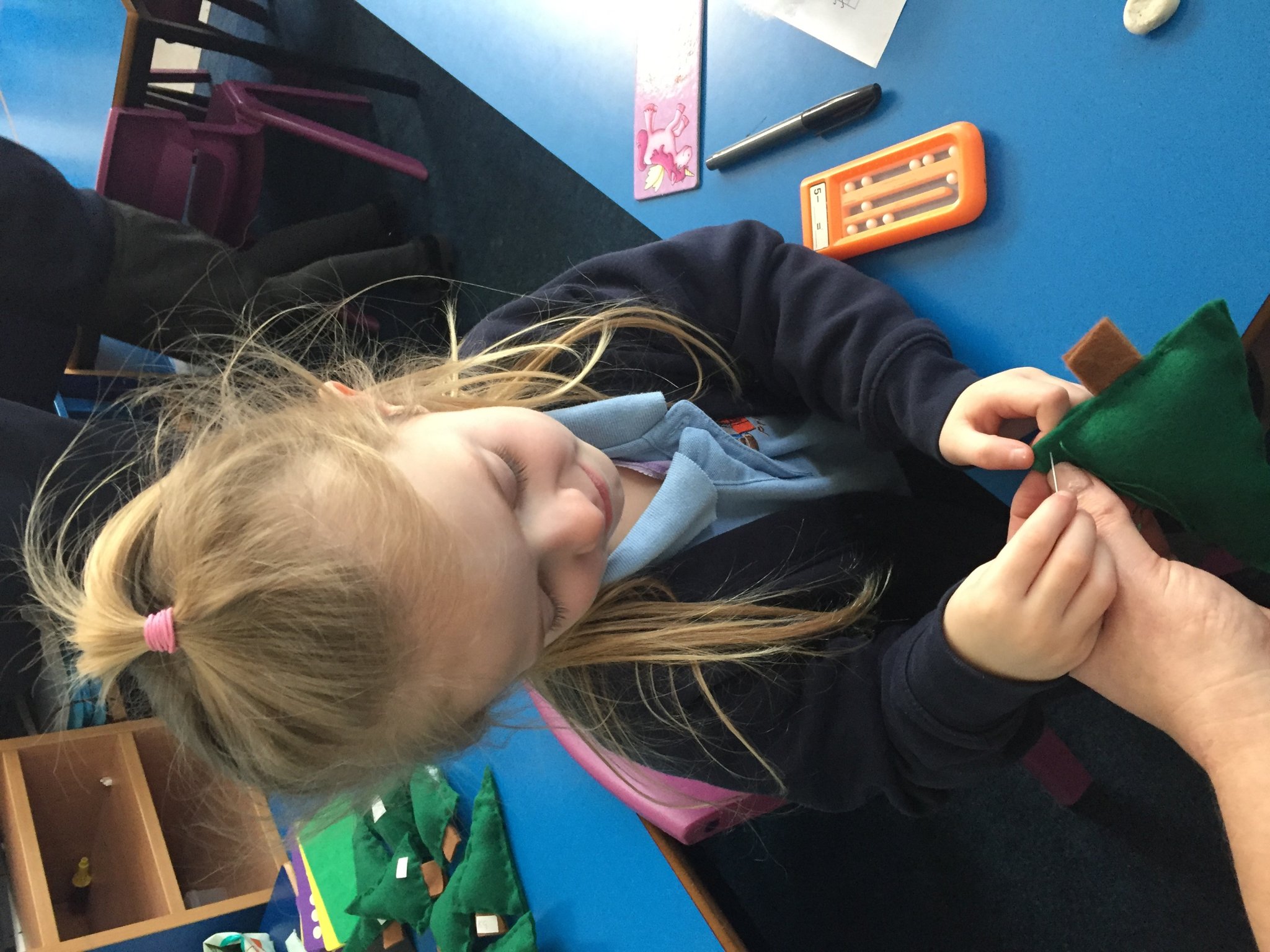 Image of Year 1 making Christmas Trees 2018