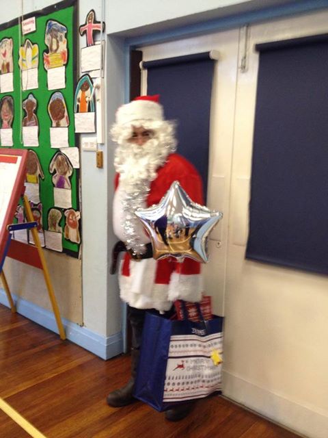 Image of Santa visits the Nursery Christmas party 