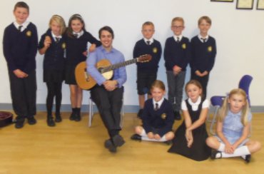 Image of Guitar Performance for the whole school