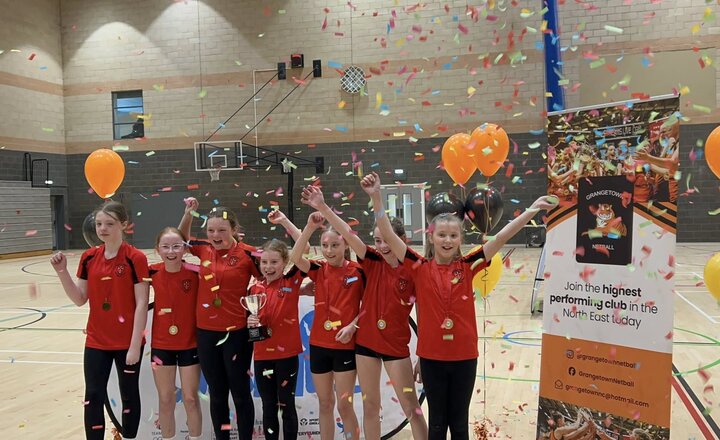 Sacred Heart Year 5 and Year 6 Netball team celebrating their amazing Netball win!