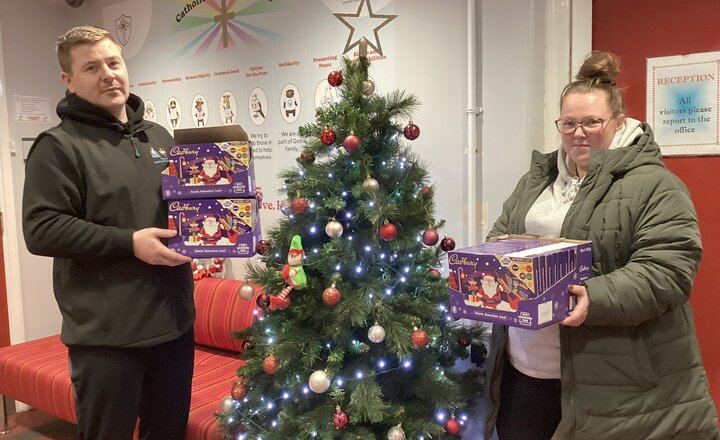 Tesco and Wilson's Carpet & Cleaning Services donate selection boxes for Sacred Hearts fundraiser