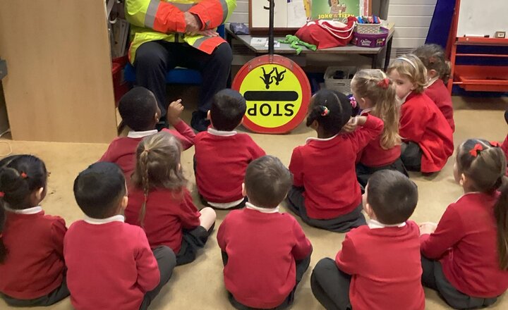 Lollipop man, Brian, visits Sacred Heart Nursery to teach pupils about road safety