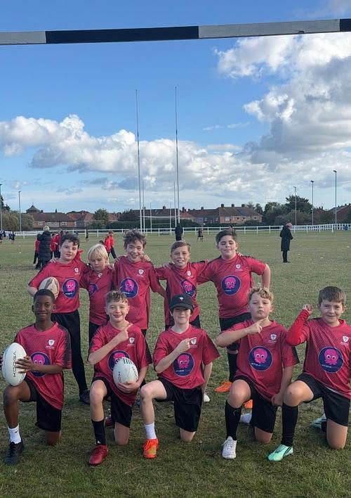 Our amazing Year 6 Rugby team after competing in the town rugby tournament