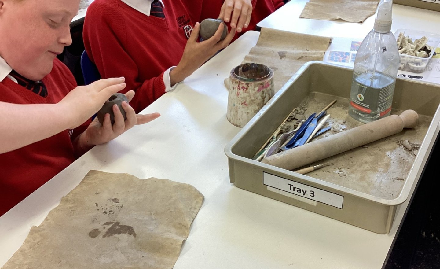 Image of Cherry making Clay Sculptures