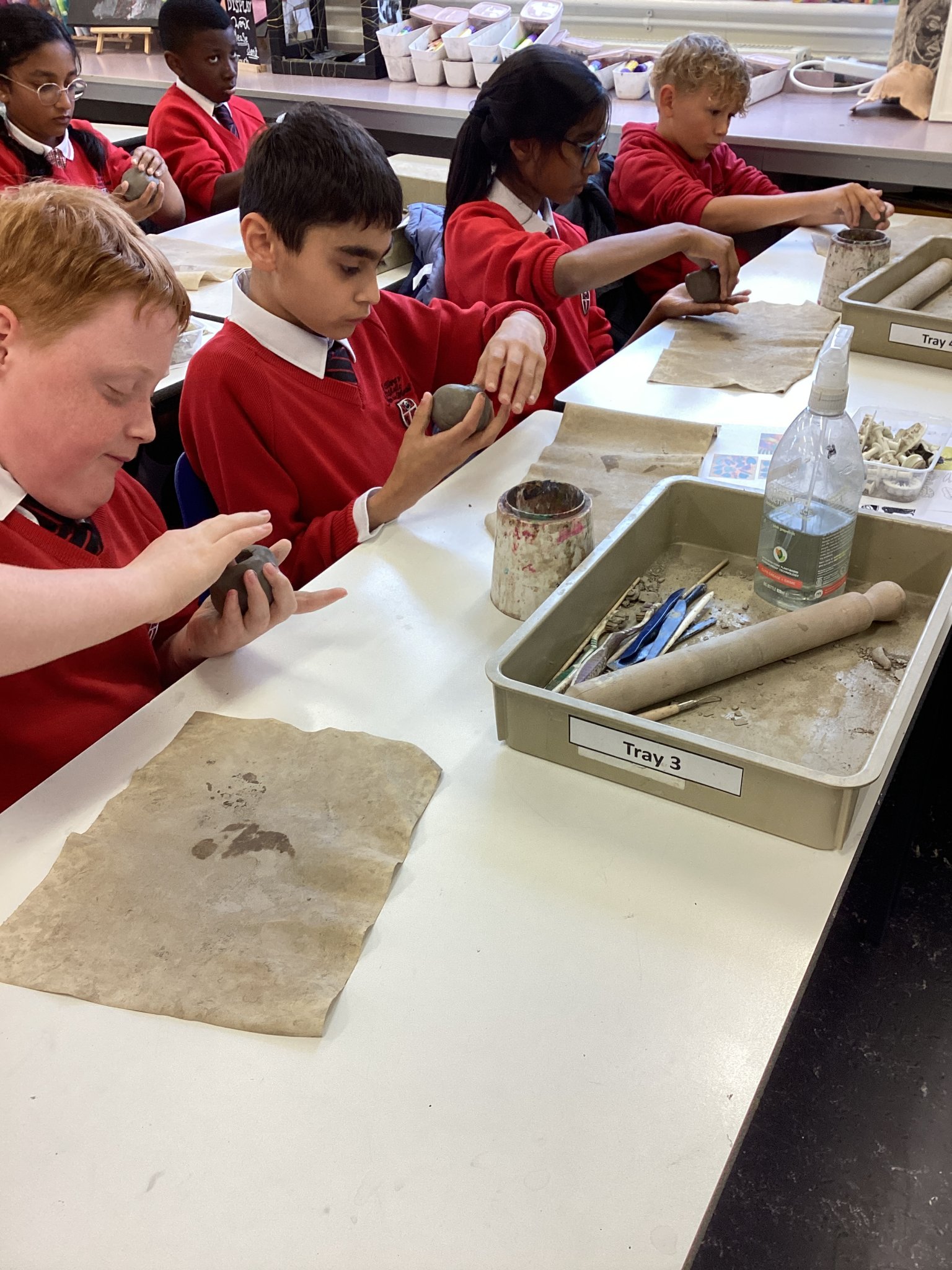 Image of Cherry making Clay Sculptures