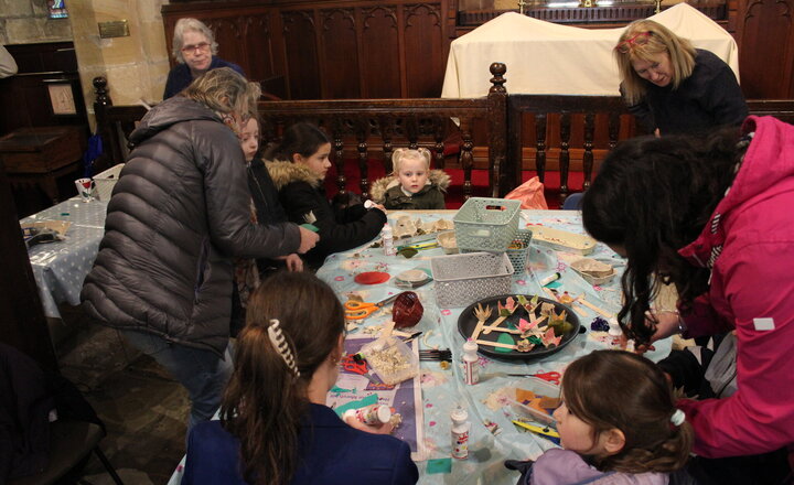 Image of Afterschool craft and snacks family activity session in church for Mother's Day.