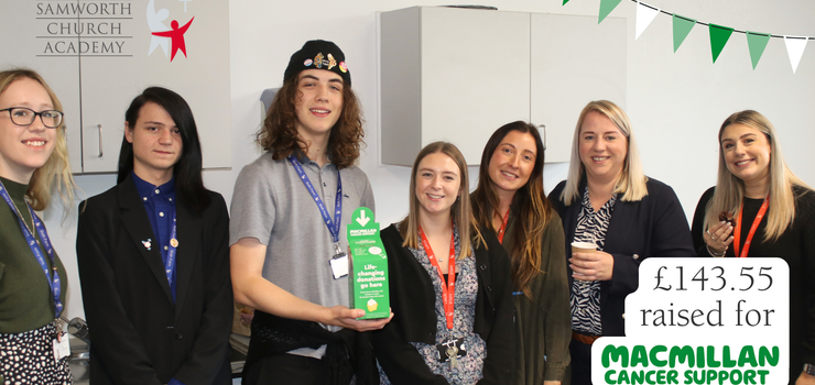 Sixth Form students and staff from Samworth Church Academy with a green donation box for Macmillan Cancer support