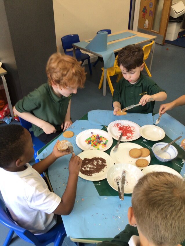 Image of Decorating biscuits with our buddies.