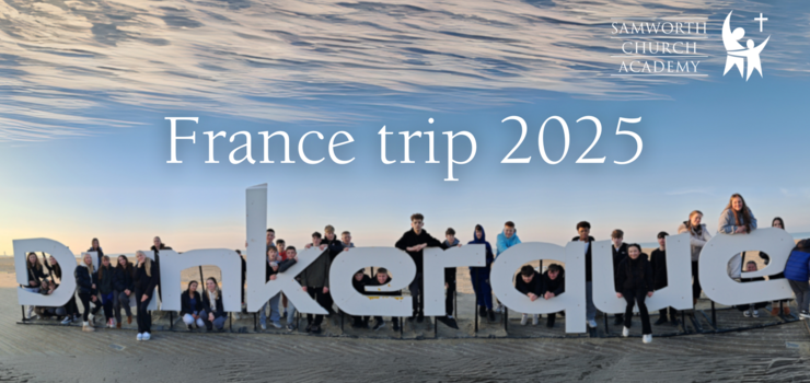 France Trip 2025 with students around a huge Dunkirk sign on the beach