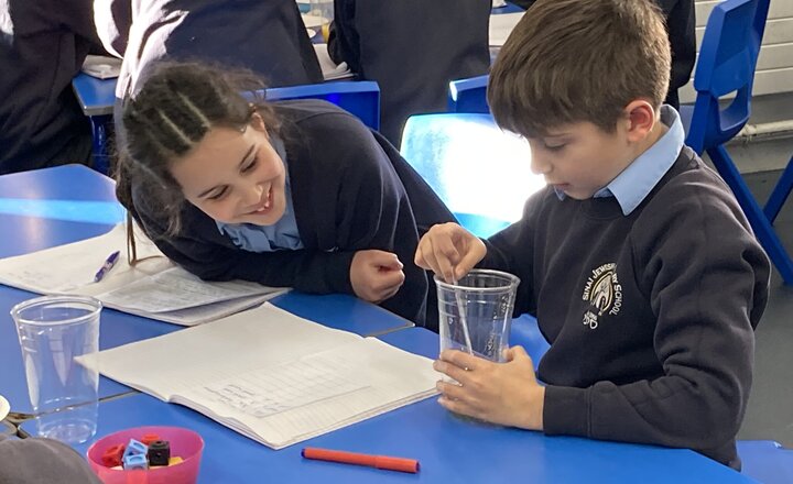 Image of Science investigation into solids and liquids 
