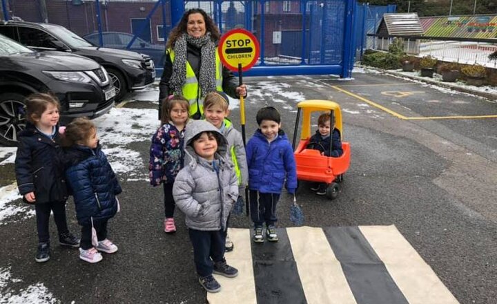 Image of Mrs Tapper turns lollipop lady to teach Road Safety