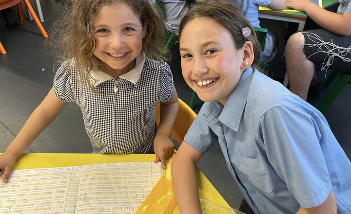 Image of Year 6 listen to Year 1 reading 