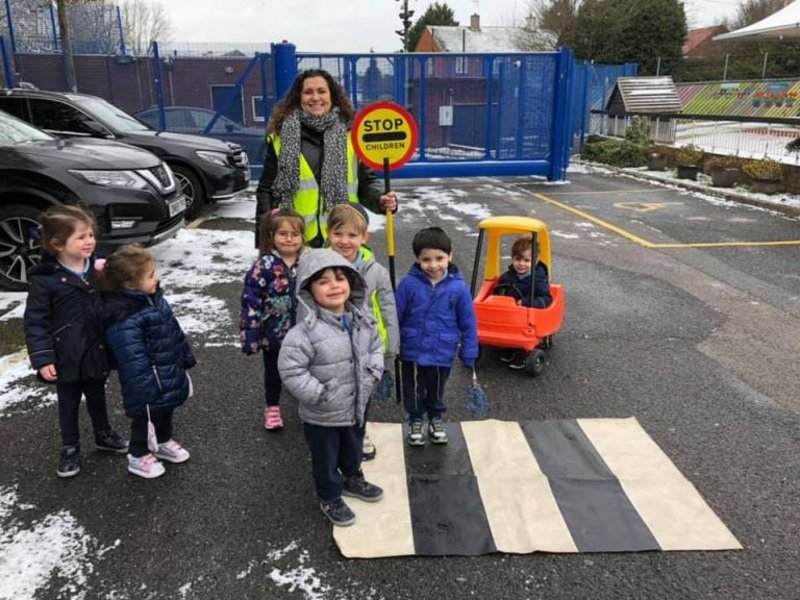 Image of Mrs Tapper turns lollipop lady to teach Road Safety