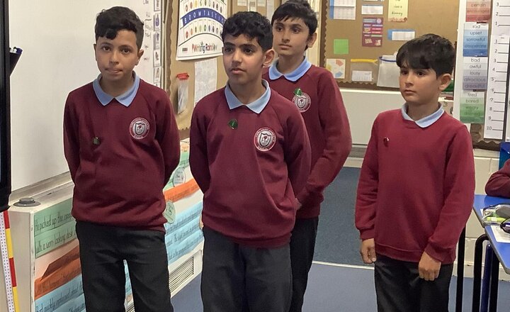 Image of A huge thank you to these boys who took the lead in our RE session this week. They came and spoke to the class about their own experiences of the Hajj and became the experts in our lesson.