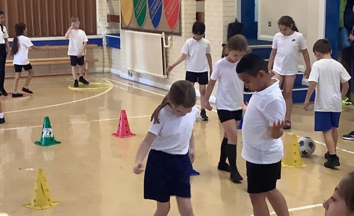 Image of Year 3 have been practicing football skills this afternoon with Coach Jake. They have had a lot of fun.