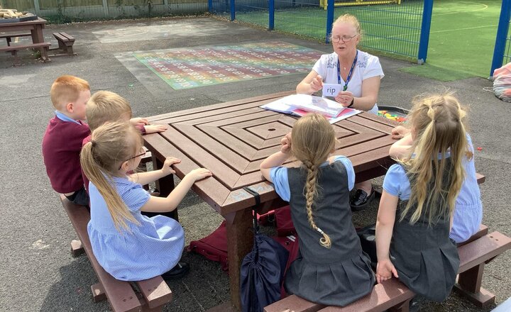 Image of Reading practice in the sun